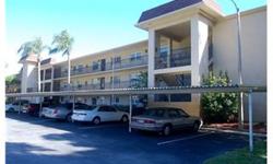 This affordable 2BR/2BA spacious condo offers a tranquil view from it's screened balcony and a split bedroom floorplan. It's located in a desirable 55+ subdivision with active clubhouse, heated pool/spa plus shuffleboard. Complex is located just a short