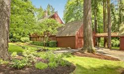 Frank Tichy Authentic Colonial home sits on a gorgeous, level 3/4 acre down a quaint lane of 4 homes in the heart of Bridle Trails. This Early American Masterpiece is reminiscent of an English 17th century manor house & an impressive replica of the