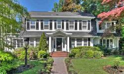 Spacious Center Hall Colonial on desirable village street walking to river, transportation, shops, & restaurants. This classic home is perfect for entertaining in the large updated EIK, formal DR, & LR with FPL. French doors from LR open to a family room