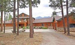 Private mountain retreat w/log & rock trim, cedar siding located on 5 treed acres minutes to downtown. Enjoy unobstructed panoramic views of the San Francisco Peaks, Schultz Pass and Mount Elden, while you watch the elk from the expansive trex deck. This