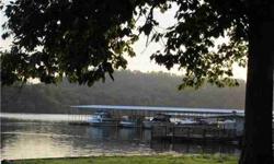 Kentucky Lake property. Lot #6 with 5.01 acres very near Eagle-Bay Marina. Wooded, private tract overlooking Turkey Creek Bay. Boat slips available. Excellent owner terms available. For more info go to Eagle Bay Marina at Turkey Creek web siteListing