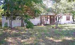 #1711R- #1711R-Older mobile home on 17 acres that borders the Corp, next to Lightfoot Landing. Mobile needs work, but the setting and location are very rare in the lake area. 2 BR, 1 BA with a front dining room, 3 bay equipment or boat shed. There's a