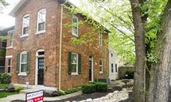 Towering trees, vibrant landscape & winding river rock beds introduce this romantic 1900's Brick Federal Row House in the heart of Historic Saint Annes Hill! Original hallmarks include gorgeous wood plank floors, transom windows & generous rm sizes