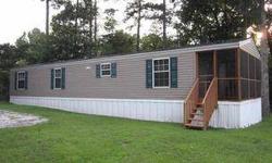 If you are looking for peaceful serenity at an affordable price this is the perfect place for you. This 2 bedroom 1 bath mobile home is in brand new condition with a large kitchen and living area, his and her closets, paver patio, and a charming screened