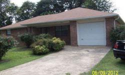 Brick 3 bedroom 2 bath home wide hallway with attached garage off highway 64 in Roland OK oversize fenced lot built in 1994 has central heat and air, new roof, mature trees
Listing originally posted at http