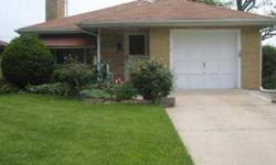 Bring all offers. Great home to live or invest. All brick ranch with hardwood floors in the bedroom. Living room and basement both have fireplaces; and large kitchen. Listing agent and office