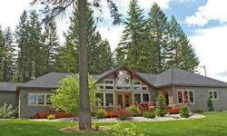 PARADISE - Beautiful Loon Lake lies minutes North of Spokane, quiet & secluded nestled within forested hills. Awaiting you is your fabulous custom built, sprawling, 3600 (+/-) sf Rancher, with quality touches throughout and a gourmet kitchen! Sits on just