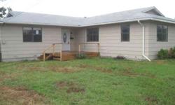 Bring your family and settle down in this quiet, peaceful area of Texas and own your own land! Enjoy this cozy 3 bedroom, 2 bath home on with the open kitchen, large bedrooms with easy to clean tile flooring in the dining room and laminate floors in the