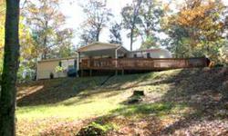 Wooded lot, good access, manufactured home on permanent foundation, CH&A, Workshop/storage, kitchen appliances & wsher & dryer, lots of closets, garden tub & shower in master bath.Listing originally posted at http