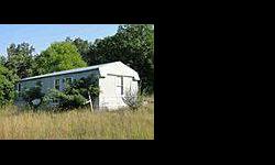 This property has over 10 acres with a 1997 Fleetwood mobile home and 9 more pads for homes, it has county water, electric and a 2000 gal. septic sewer system to service the property.Listing originally posted at http