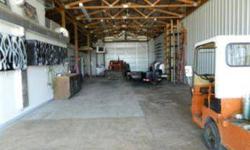 6 farmable acres w/40X80 pole barn. Barn is equipt for small business office. Insulated heat, water, electric, kitchenette & fullsize bath. THis property can be purchased w/9366 US Hwy 68
Listing originally posted at http