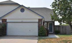 Welcome to this nice 2 bedroom 1.5 bath twin home with over 1500 square feet of living space. Home offers a 2 car garage and is located near the air base and QT at Pawnee and Rock Rd. Inside you can find a fireplace and vaulted ceilings in the living