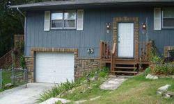 3 Bedroom 2 Bath Fenced Yard just minutes to the Branson Landing. You will love the easy drive to downtown Branson. Nice Open Living Area,fenced in yard and more. This is a Short Sale.This Home is close to the Lake Shopping and the Branson