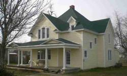 Here is a remarketable historic house that has lots of updates but still retains the orginal look. With a large living area and dining room and a Coke theme kitchen. A beautiful wrap around stair case leading up to three bedrooms up stairs. All kinds of