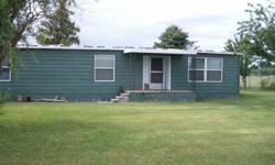 Older manufactured home in really good condition. Updated w/ newer vinyl windows, carpet & vinyl. New gas furnace and a/c in 2010. Property fenced with chain link type fencing and a wood privacy fence in the front. Covered back patio. Lots of out
