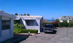 Ocean View on the bluff
Walk to the store, beach or the pool. Mira Mar, Oceanside's best gated, 55+ Senior community. Space #48, 2 bedroom 1 bath doublewide with California room, built in 1977 mobile home, remodeled bathroom with skylight, refrigerator,