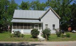 Older home with newer roof and windows also a newer a/c unit. There is a building out back with sleeping quarters and other buildings for storage. The home has high ceilings and offers lots of space.
Listing originally posted at http
