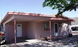 Remodeled older 3 bedroom home in well established neighborhood! Large corner lot, lots of parking, enjoy extra living space in the enclosed patio!
Listing originally posted at http