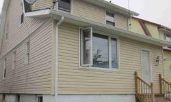 Exterior Newer Vinyl Siding and replacement windows. Garage needs siding. Interior needs TLC. Needs updated kitchen. Hardwood floors needs refinishing. Walls could use a coat of paint. Basement could be converted to studio apt., has separte entrance.