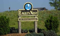 In the beautifull Shenandoah Valley VA- where Skyline Drive meets the Blue Ridge Parkway you will find Eagle's Nest Airport. A beautiful Aviation Community where every lot has Mtn Views and paved taxi way to the lighted runway.This is a rare opportunity