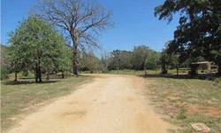 RETREAT TO THE COUNTRY WITH ONLY A SHORT DISTANCE FROM THE THE CITY TO THIS 11.374 ACRES WITH CLEAR ED AREA FOR HOMESITE. TWO SEPTICS ON PROPERTY. LARGE STOCKED POND . PORTION OF THE PROPERTY IS WOOD ED FOR RECREATIONAL USE FOR HUNTING, HORSE PEN,