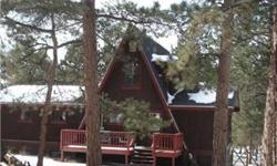 Great level property just a few miles north of Hwy 24 off of east edge of Lake George, CO. The interior has been updated since 2008 including kitchen floors, counters, cabinets and appliances as well as the entry and lower level. Also a re-roof since