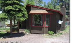 Delightful cozy cabin! This 2 bedroom, 1 bath, 924 sq. ft. home has many things for you to appreciate. Large windows in front have built in seating and provide plenty of natural light for a very open feel creating the perfect ambiance to gather around the