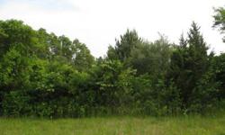 This lovely building parcel affords ample room for home and pool and is just minutes to village center.Listing originally posted at http