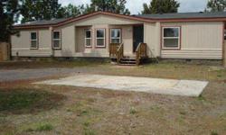 Manufactured Home on over 1 acre located between Bend & Sisters in Sun Mt. Estates. 3 bedroom/2 bath with large bonus room. Back yard compleyely fenced. HUD owned property. Please visit HUDHomestore.com for more information and availabilty. Listed by