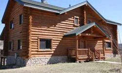 Live right on the river & enjoy the sound of its flow, the wildlife & this special retreat! Located on 10 acres, this handsome log home is a taste of Colorado. With cathedral ceilings, hand-hewn logs from the property, cedar fireplace mantels and large