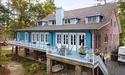 Amenities incl shared boat launch, gazebo & dock, private 280' white sand beach & huge cv'd patio perfect for crawfish boils or parties. 5 beds, but could easily be more! Ample storage space. Fabulous Gourmet kitchen. Mst ste newly remodeled to incl new