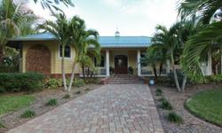 W. Riverside Drive Beauty. Located on one of the most desired streets in Fort Myers, this beautiful home meets the standards of W. Riverside Drive in a grand way. Across the street from the river, this 1/2 acre, tree-shaded corner lot is graced with a