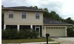 SHORT SALE. Nice 2 story home within walking distance to Lake Ariana. 3 bedroom 2.5 bath. Wood floors in living room. Formal dining area. Inside laundry area. All bedrooms have walk-in closets. Dual sinks in master bath. Lakeview from front yard. Close to