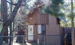"COZY BIG BEAR CABIN". START ENJOYING BIG BEAR TODAY IN THE CHARMING CABIN. 2 BEDROOMS, ONE IS A LOFT. LITTLE COUNTRY KITCHEN. NICE LIVING AREA WITH A BEAUTIFUL STONE FIREPLANCE AND T&G THROUGHOUT. LOCATED ON A LEVEL STREET TO STREET LOT, FULLY FENCED