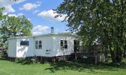 You will enjoy the views of this property for miles. 2 bedroom home with full bath and oversized 1 car attached garage. Start your own little hobby farm on the 3.42 acres. Pellet stove in living room, and all appliances are included in listing.Taxes