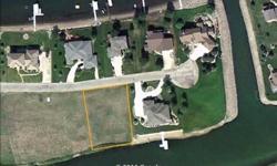Beautiful Lot on the South side of Lake Madison's Woodland Marina with 120 FEET OF FRONTAGE! Blacktop road access with utilities available. Surrounded by gorgeous homes and amazing scenery, Lake Madison is a great getaway only 45 minutes from Sioux Falls!