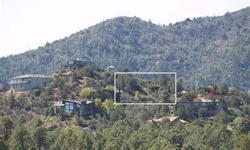 THIS LOT IS BREATHTAKING!See for miles from atop this approximate 1/3 acre lot in Hassayampa Hill with truly panoramic views. Lot is double sided with tow possible entrances.No HOA's and minutes from downtown Prescott.Owner may carry.Listing originally