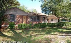 **SELLER OWNED**3/2 2100 SQ FT HOME WITH A 2000 SQ FT AN A .41/ACRE DOUBLE CORNER LOT WITH A **GARAGE/WORKSHOP!!!!COMPLETE WITH FULL ELECTRICAL!! IF YOU HAVE TOYS THIS IS THE HOME FOR YOU!!!BRICK AND BLOCK CONSTRUCTION,FORMAL LIVING ROOM,FORMALE