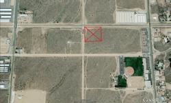 2.2 Acre "General Industrial" zoned bare lot in Hesperia. Flat and level, with a railroad spur. Unlimited potential. Less than a block off of I Street, on the NE corner of G and Live Oak. Easy access to Main St., Bear Valley and the 15 freeway. Fire