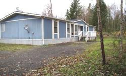 Affordable country living near Barrier Dam & the Cowlitz River! This well laid out home has it all, the kitchen sits in the center embraced by a spacious living rm. with wood stove & dining rm. with built in China hutch. There's a spacious den/office near