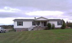 2401 - Harrogate, TN - This beautiful, immaculate manufactured home is located on a large lot convenient to LMU, Middlesboro and Ewing; 3 bedrooms; 2 full baths; eat-in kitchen; living room; dining room; central heating and air; front and back porches;
