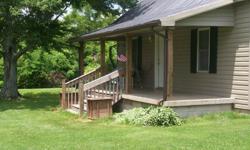 A rare find this close to town and ready to move into! Remodeled country cottage on 38 +/- acres-loads of privacy but only 10 minutes from town- 6 miles from Boone Tavern in Berea, Kentucky or 9 miles from Renfro Valley in Mt. Vernon, Kentucky. Acreage is