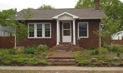Wonderful brick home with newer windows in a great neighborhood. Beautiful hardwood floors, original woodwork, master suite w/walk-in closet, etched window in Master BR, extra office space and pantry off kitchen. Roof new in 2009.
Listing originally