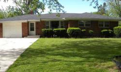 Brick ranch charmer features newer roof, furnace, carpet and water tank. Enjoy your evenings sitting in your sunroom overlooking your large backyard..