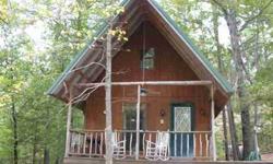 CHALET IN THE FOREST. YOUR OWN PRIVATE GETAWAY. 2 BEDROOMS, 1 BATH, OFFICE, GAS LOG. ALL KNOTTY PINE. SITTING ON 7+ ACRES CLOSE TO YELLVILLE. DETACHED 20 X 30 HEATED BUILDING. 200' OF BLACKTOP FRONTAGE IN A CUL-DE-SAC. LOTS OF TALL PINE ANDDOGWOODS.