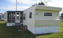 I am selling a 1968 10 x 60 mobile home located at Inlet Breeze Mobile Home Park, Inlet Lane, Lot #6, Cedar Point, NC (just off 24 east of Hwy 58.) It is 2 bedrooms, living room, kitchen and 1 1/2 baths, screened in porch (approximately 12 x 12). It is
