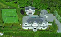 Bridgehampton south new construction Magnificent 15,000+/- sq. ft. gambrel style home located south of the highway on 2.8 acres featuring high quality finishings throughout, an all weather tennis court, 25? x 55? heated gunite pool, a three car garage and