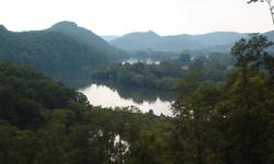 2 lots overlooking Cordell Hull Reservoir. Water, sewer, power. 65 mi. east of Nashville. Tax appraised $100,000.