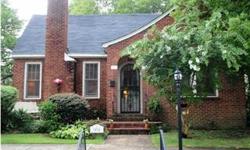 This brick beauty is located in downtown Gadsden Historic Area and is charming, classy and waiting for you. Enter into this lovely home thru the living room with fireplace (gas logs), hardwood floors, crown molding,and built in book cases. Formal dining