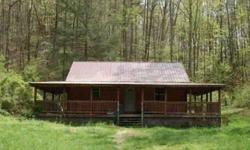 Beautiful log cabin located on 5 acres tucked between 2 forest ridges. The property has a running creek and work shed. Home is 3br/1ba large porch. Recent updates include